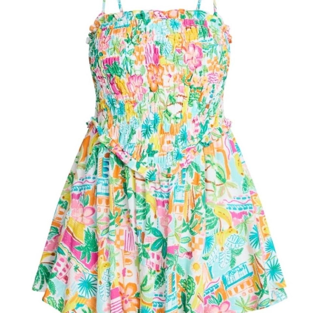 A multicolored tropical print romper.